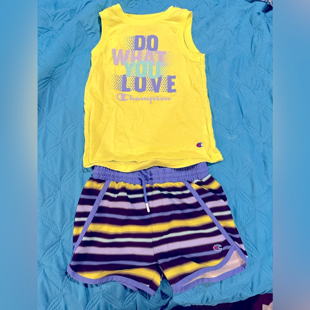 Girls Champion set size 5/6, shorts worn once and top is brand new.
